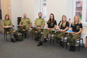 Grupa funkcjonariuszy SG w sali wykładowej podczas szkolenia Grupa funkcjonariuszy SG w sali wykładowej podczas szkolenia